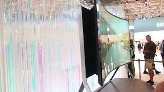 The worlds first and largest bendable 105inch curved UHD TV from Samsung [upl. by Behre877]