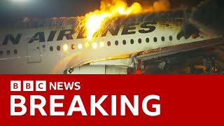 Japan Airlines plane in flames on the runway at Tokyos Haneda Airport BBC News [upl. by Yotal401]