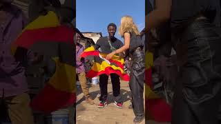 The old man asked if he could hold the flag🇺🇬😅 uganda travel africa isabellafro dance [upl. by Tybald]