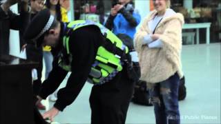 Police officer playing on a public piano at St Pancras International [upl. by Annovahs366]