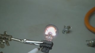 Popping Light Bulbs With High Voltage [upl. by Ynohtnad397]