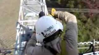 Lineman installing shield wire bond [upl. by Horacio]