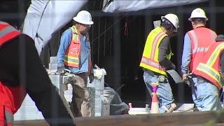 More new pavers being installed on 16th Street Mall [upl. by Silda831]