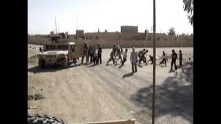 Soldier gives Iraqi Children Candy  Zangora [upl. by Lativa]