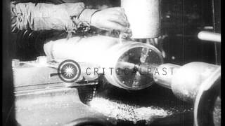 Munitions being manufactured in a German factory during World War I HD Stock Footage [upl. by Ojeitak]