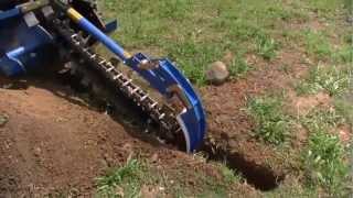 Auger Torque MT900 Trencher on Kubota SVL75 [upl. by Aicirpac]