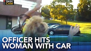 Video shows police officer plowing down woman in parking lot [upl. by Brentt]