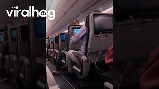 Airline Passenger Upset at Reclined Seat  ViralHog [upl. by Haines]