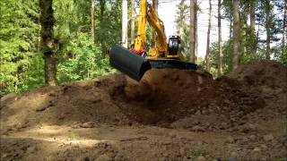 Fumotec Grabennräumer am Schwenkwechsler im Einsatz am Komatsu PC490 [upl. by Erdnaet147]