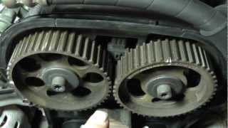 Suzuki Forenza with Broken Timing Belt  Part 1 Timing Cover Removal [upl. by Pathe]