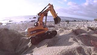 RC excavator HuinaSP800 on the beach [upl. by Retxab]