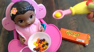 Baby Alive Super Snackin Lily Doll eats Reeses Pieces Candy for a Snack [upl. by Rebm]