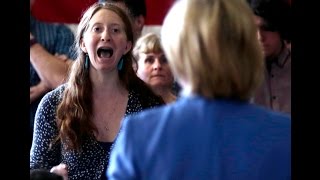 Hillary Clinton incoherent on ClimateChange heckled by women activists in NH [upl. by Namdor989]