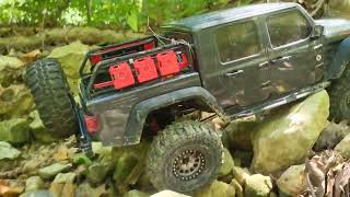 Axial SCX103 Gladiator summer time creek crawl [upl. by Atiruam]