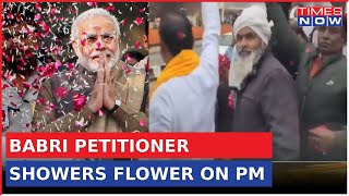 Babri Masjid Petitioner Iqbal Ansari Showers Flower Petals On PM Modi Amid Ayodhya Visit [upl. by Eustatius212]