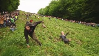 Gloucester Cheese Rolling 2012 OFFICIAL  Worlds Stupidest Competition [upl. by Ahsyekal964]