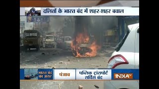 SCST Act Violent protests erupt in Madhya Pradesh Rajasthan Bihar UP with firing amp arson [upl. by Dag883]