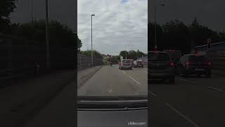 Brave or Stupid cyclist running red light against motorway rush hour traffic shorts [upl. by Bianca778]