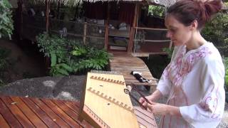 Dizzi Playing the Sanctuary music on a chilled medieval dulcimer in Thailand [upl. by Dory]