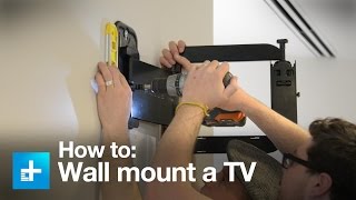 How to wall mount a TV with the Sanus full motion VMF322B1 [upl. by Sesmar]