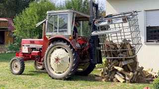 Brennnholz Gitterboxen mit Kistendrehgerät Hubmast und IHC 433 ausfahren und auskippen [upl. by Ahsiem]