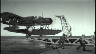 American float plane OS2U catapulted from battleship and bombardment at San FernaHD Stock Footage [upl. by Redla]