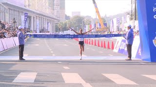 GLOBALink  Ethiopian runners win at Xiamen Marathon [upl. by Navak]