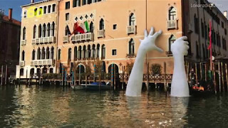 Giant Hands Raise From The Water In Venice To Fight Global Warming [upl. by Peedus898]