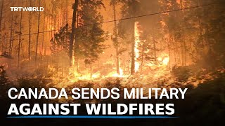 Firefighters battle raging wildfires throughout Canada [upl. by Htieh286]