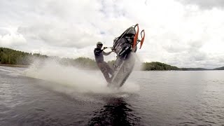 Snowmobile wheelies on water [upl. by Eyllom5]