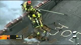 Roof collapse close call for firefighters [upl. by Elleryt245]