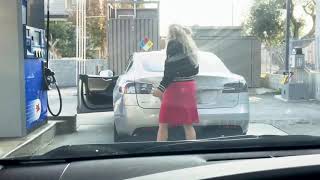 Blonde woman tries to fill up a Tesla Model S with gas [upl. by Artek187]