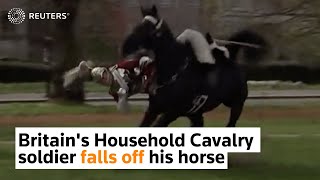 Britains Household Cavalry soldier falls off his horse [upl. by Idleman]