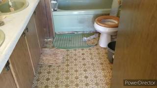 NEW VIDEO 1971 MOBILE HOME BATHROOM FLOOR REPAIR [upl. by Anevad]