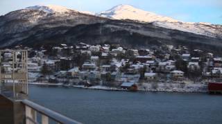 Finnsnes  Einfahrt des Hurtigrutenschiffs MS Midnatsol in den Hafen [upl. by Anaillil510]