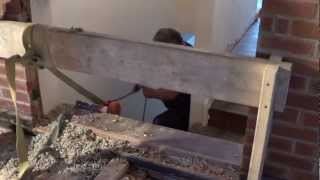 Moving A Quarter Ton Lintel Down Stairs [upl. by Holcomb473]