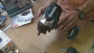 Makita DTW1002 18V LXT BRUSHLESS IMPACT WRENCH unpacking review [upl. by Gratianna527]