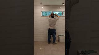 Caulking with silicone Easy tile howtotile silicone caulking [upl. by Delmer455]