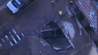 Car stuck in Gravesend after leak causes sinkhole [upl. by Rafaelita]