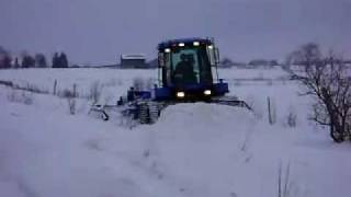 Snowmobile Trail Grooming New Holland TV 140 Four Track With the new VARIBLE WIDTH SNOW DRAG [upl. by Gustin776]