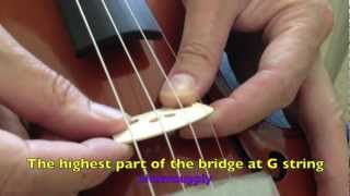 How to set up a violin bridge and tune a violin with a clip violin tuner [upl. by Arihk854]