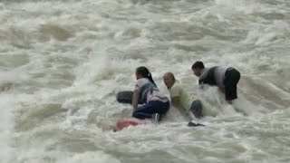 Firefighters Rescue Three from Flooded River in Southwest China [upl. by Aidnac]