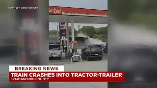 Caught on cam Train hits tractortrailer in Spartanburg County [upl. by Sailesh]