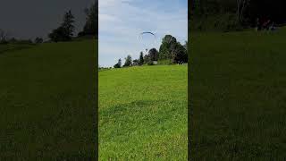 Paraglider lands near Oberwil canton Zug Switzerland [upl. by Ycats]