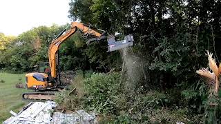 Sany sy80u loftness battle ax eating trees forestrymulching [upl. by Alyhc216]