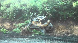 CAT dozer clearing brush [upl. by Aileahcim]