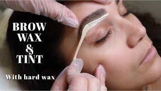 BROW WAX amp TINT TUTORIAL  Step by Step With Hard Wax  Licensed Esthetician [upl. by Nothgiel]