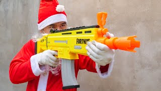 NERF WAR CHRISTMAS SANTA CLAUS BATTLE 3 [upl. by Wadlinger182]