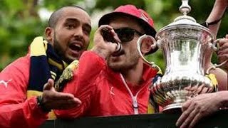 Wilshere and Arsenal fans taunt Tottenham during FA Cup parade [upl. by Nhguavoj]