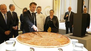 Macron sert la galette de lÉpiphanie à lÉlysée  AFP Images [upl. by Amadus]